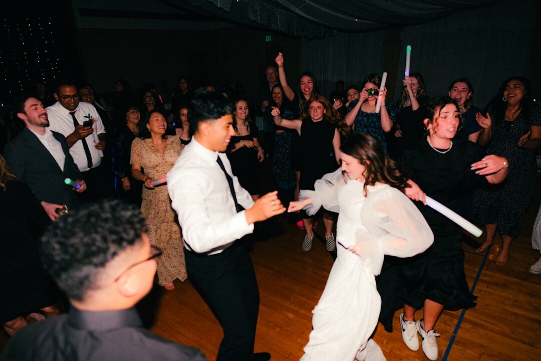 Wedding guests dancing at a Danish countryside reception