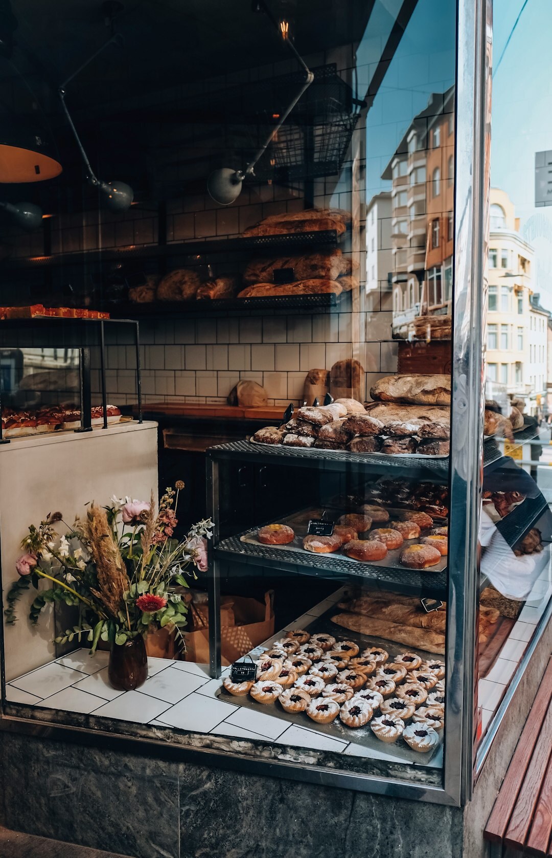 Interior of a small Danish bakery with fresh bread on display