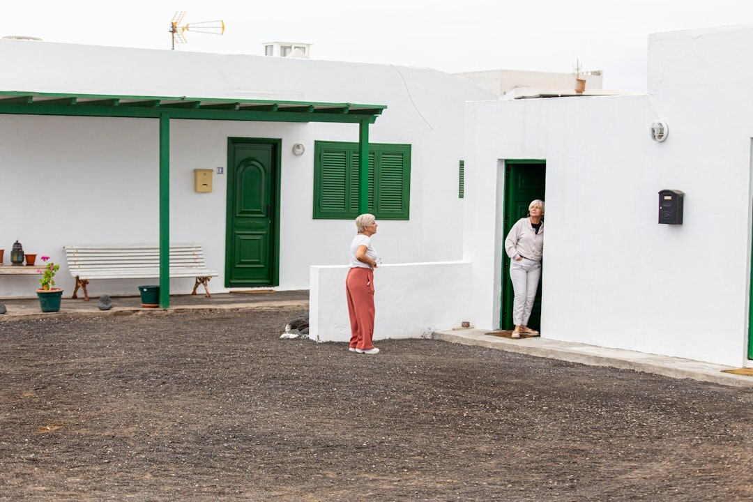 elderly woman talking to neighbors